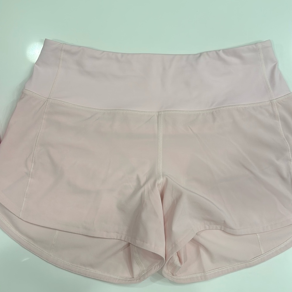 Lululemon Speed Up High-Rise Lined Short 4" in flush pink